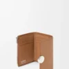 Petit portefeuille vertical Pebble en cuir de veau grainé Pebble Moka
