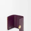 Petit portefeuille vertical Pebble en cuir de veau grainé Pebble Prune