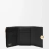 Petit portefeuille vertical Pebble en cuir de veau nappa brillant Black