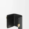Petit portefeuille vertical Pebble en cuir de veau nappa brillant Black