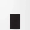 Petit portefeuille vertical Pebble en cuir de veau nappa brillant Black
