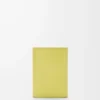 Petit portefeuille vertical Pebble en cuir de veau nappa brillant Light Citrine