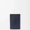 Petit portefeuille vertical Puffer Anagram en cuir de veau nappa brillant bleu marine foncé Petit portefeuille vertical Puffer Anagram en cuir de veau nappa brillant bleu marine foncé