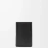 Petit portefeuille vertical Puffer Anagram en cuir de veau nappa brillant Noir Petit portefeuille vertical Puffer Anagram en cuir de veau nappa brillant Noir