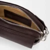 Petit sac messager Pebble en cuir de veau grainé souple Oxblood