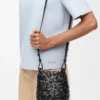 Petit sac Nest Basket en cuir de veau noir