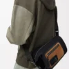 Petit sac seau Flex Loop en toile et daim noir/doré foncé