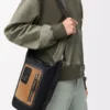 Petit sac seau Flex Loop en toile et daim noir/doré foncé