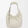 Petit sac Squeeze en cuir d&rsquo;agneau nappa souple, couleur sel de mer