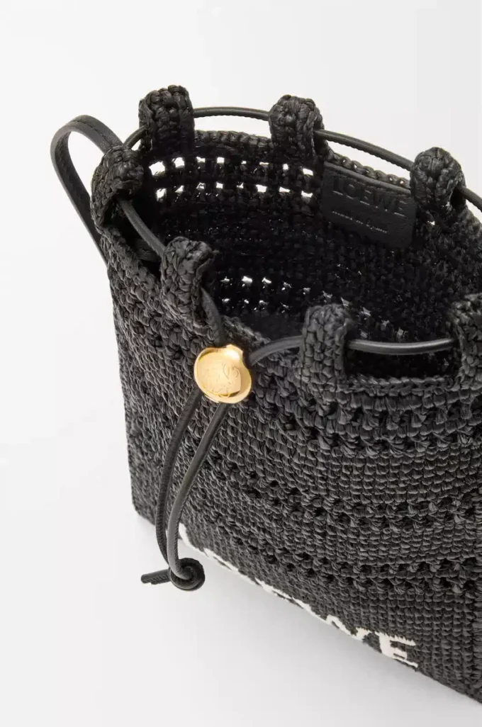 Pochette à cordon en raphia noir