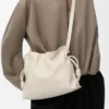 Pochette Flamenco moyenne en cuir de veau nappa Sea Salt