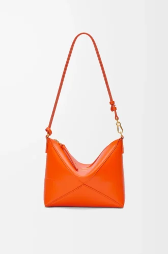 Pochette Puzzle Fold en cuir de veau nappa brillant Vivid Orange