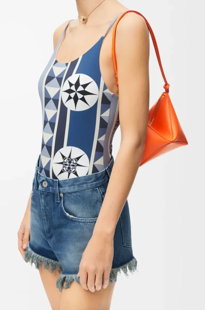 Pochette Puzzle Fold en cuir de veau nappa brillant Vivid Orange