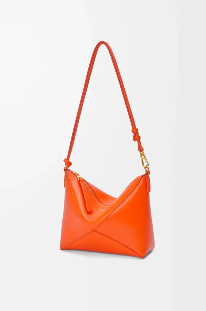 Pochette Puzzle Fold en cuir de veau nappa brillant Vivid Orange