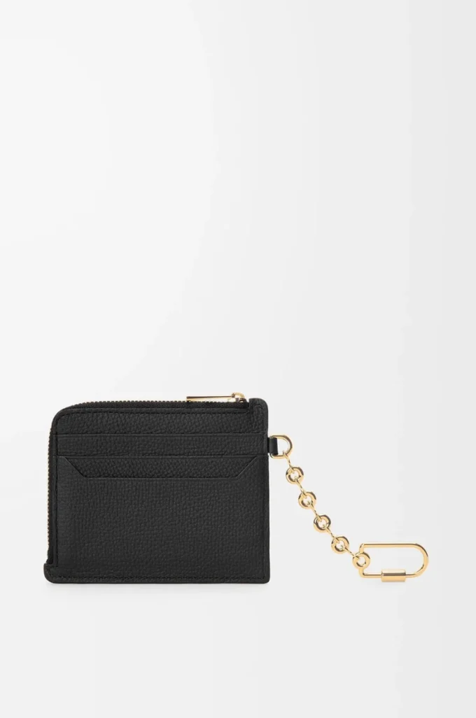 Porte-cartes carré Anagram en cuir de veau grainé Black/Gold Porte-cartes carré Anagram en cuir de veau grainé Black/Gold