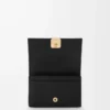 Porte-cartes de visite Anagram en cuir de veau grainé Black/Gold Porte-cartes de visite Anagram en cuir de veau grainé Black/Gold