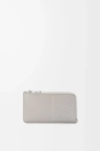 Porte-cartes et monnaie en cuir de veau satiné gris coquillage Porte-cartes et monnaie en cuir de veau satiné gris coquillage
