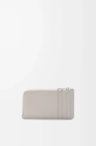 Porte-cartes et monnaie en cuir de veau satiné gris coquillage Porte-cartes et monnaie en cuir de veau satiné gris coquillage