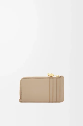 Porte-cartes et monnaie Pebble en cuir de veau nappa brillant Sand