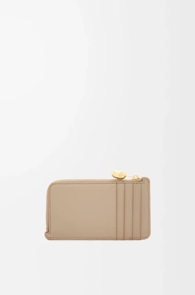 Porte-cartes et monnaie Pebble en cuir de veau nappa brillant Sand Porte-cartes et monnaie Pebble en cuir de veau nappa brillant Sand