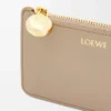 Porte-cartes et monnaie Pebble en cuir de veau nappa brillant Sand Porte-cartes et monnaie Pebble en cuir de veau nappa brillant Sand