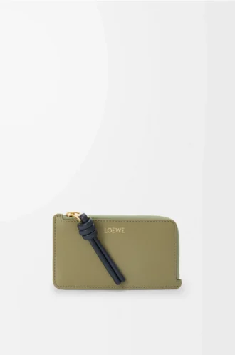 Porte-cartes et porte-monnaie Knot en cuir de veau nappa brillant Eucalyptus/Deep Navy