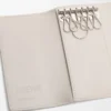 Porte-clés Anagram en cuir de veau grainé Light Ghost Porte-clés Anagram en cuir de veau grainé Light Ghost