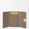 Porte-clés Anagram en cuir de veau grainé Taupe Porte-clés Anagram en cuir de veau grainé Taupe