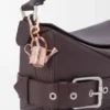 Porte-clés arrosoir en or rose