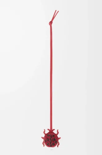 Porte-clés coccinelle en cuir perlé rouge rubis