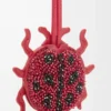 Porte-clés coccinelle en cuir perlé rouge rubis
