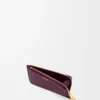 Porte-monnaie et cartes en cuir de veau grainé Pebble, couleur Prune Porte-monnaie et cartes en cuir de veau grainé Pebble, couleur Prune