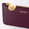 Porte-monnaie et cartes en cuir de veau grainé Pebble, couleur Prune Porte-monnaie et cartes en cuir de veau grainé Pebble, couleur Prune