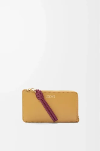 Porte-monnaie et cartes Knot en cuir nappa brillant Sahara/Crimson