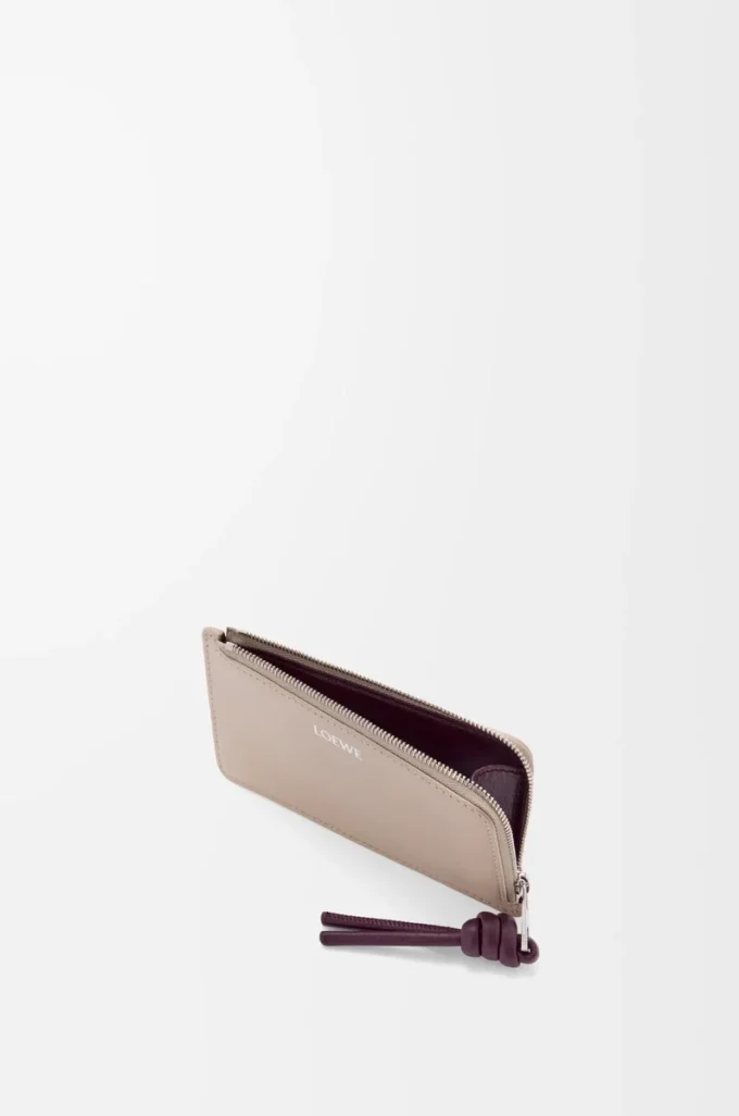 Porte-monnaie Knot en cuir de veau nappa brillant Clay/Plum Porte-monnaie Knot en cuir de veau nappa brillant Clay/Plum