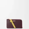 Porte-monnaie Knot en cuir de veau nappa brillant Dark Burgundy/Light Citrine Porte-monnaie Knot en cuir de veau nappa brillant Dark Burgundy/Light Citrine