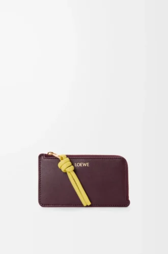 Porte-monnaie Knot en cuir de veau nappa brillant Dark Burgundy/Light Citrine