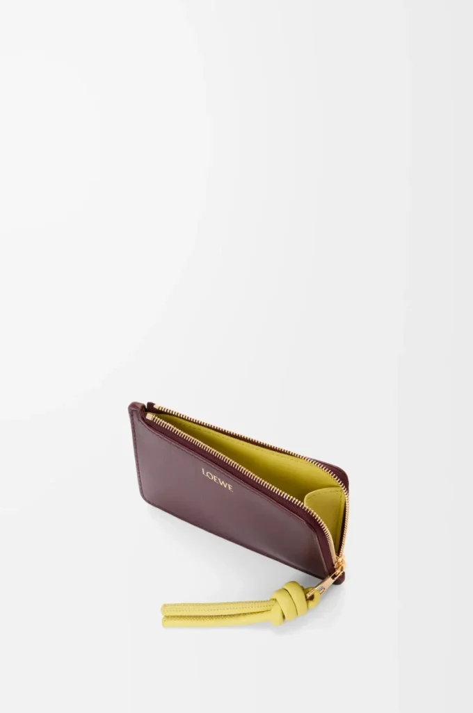 Porte-monnaie Knot en cuir de veau nappa brillant Dark Burgundy/Light Citrine Porte-monnaie Knot en cuir de veau nappa brillant Dark Burgundy/Light Citrine