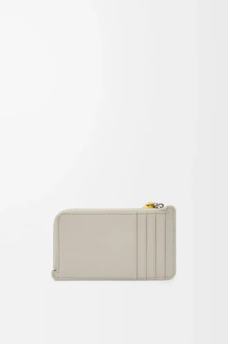 Porte-monnaie à nœud en cuir de veau nappa brillant Shell Grey/Dandelion