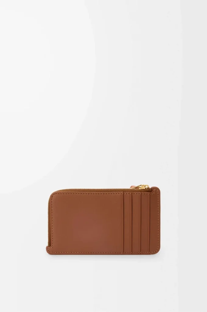 Porte-monnaie à nœud en cuir de veau nappa brillant Tan/Papaya Porte-monnaie à nœud en cuir de veau nappa brillant Tan/Papaya