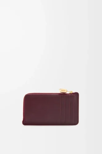 Porte-monnaie Pebble en cuir de veau nappa brillant Burgundy