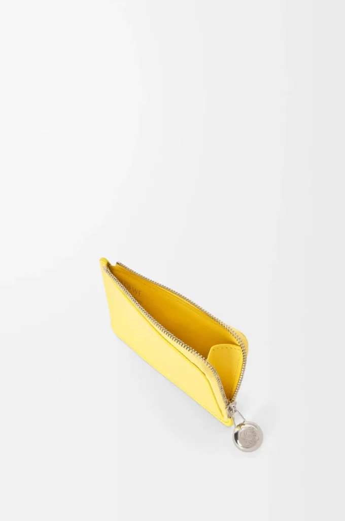 Porte-monnaie Pebble en cuir nappa brillant Baby Corn Porte-monnaie Pebble en cuir nappa brillant Baby Corn
