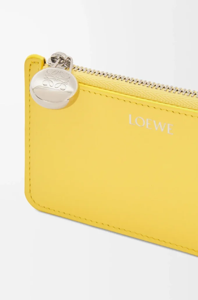 Porte-monnaie Pebble en cuir nappa brillant Baby Corn Porte-monnaie Pebble en cuir nappa brillant Baby Corn