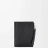 Portefeuille compact et fin Puzzle en cuir de veau grainé souple Noir Portefeuille compact et fin Puzzle en cuir de veau grainé souple Noir