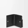 Portefeuille compact et fin Puzzle en cuir de veau grainé souple Noir Portefeuille compact et fin Puzzle en cuir de veau grainé souple Noir