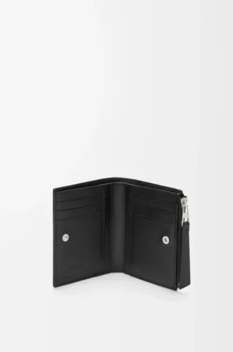 Portefeuille compact et fin Puzzle en cuir de veau grainé souple Noir Portefeuille compact et fin Puzzle en cuir de veau grainé souple Noir