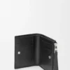 Portefeuille compact et fin Puzzle en cuir de veau grainé souple Noir Portefeuille compact et fin Puzzle en cuir de veau grainé souple Noir