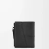 Portefeuille compact et fin Puzzle en cuir de veau grainé souple Noir Portefeuille compact et fin Puzzle en cuir de veau grainé souple Noir