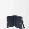 Portefeuille compact Knot en cuir de veau nappa brillant Eucalyptus/Deep Navy