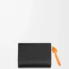 Portefeuille compact Knot en cuir de veau nappa brillant Noir/Orange vif